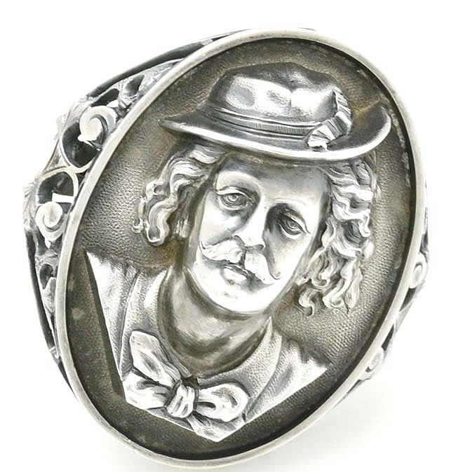 male head on Wood and Hughes napkin ring
